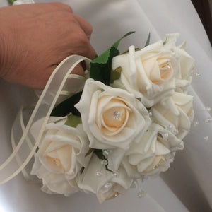 a wedding bouquet of blush champagne foam roses