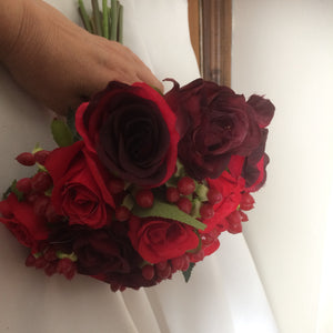 handtied wedding bouquet of red and burgundy roses