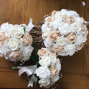 beige white and ivory artificial wedding bouquet with pearl decorations