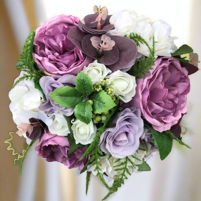 wedding bouquet of mauve and lilac flowers
