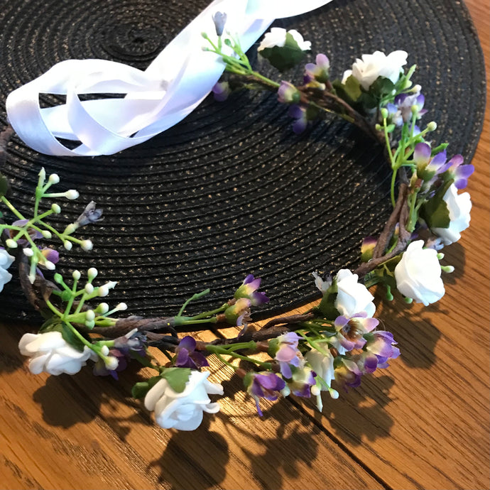 wedding circlet of white roses and purple flowers