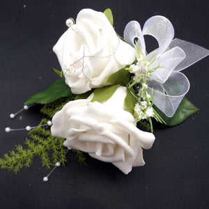 An artificial wedding corsage of two foam rose - choice of 35 colours