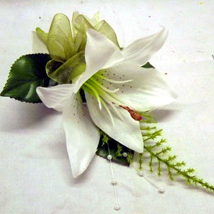 wedding buttonholes ivory lily with organza bow