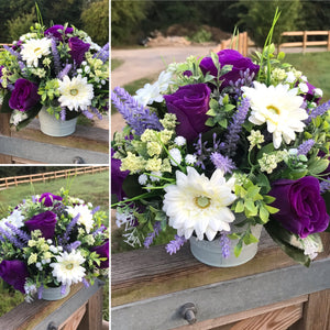ivory, purple and lilac flower arrangement