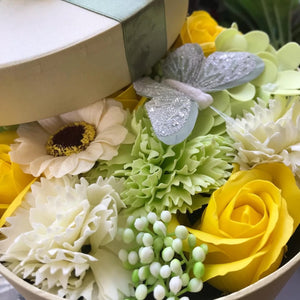 soap flowers in pearlescent hat box - yellow