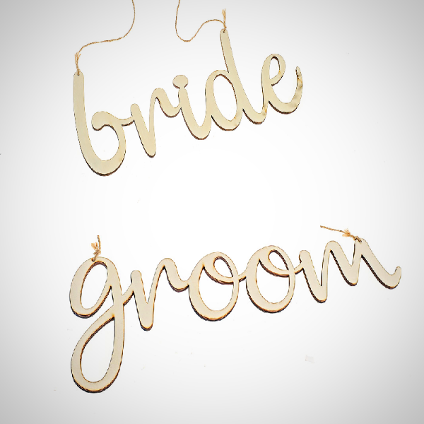 bride and groom sign
