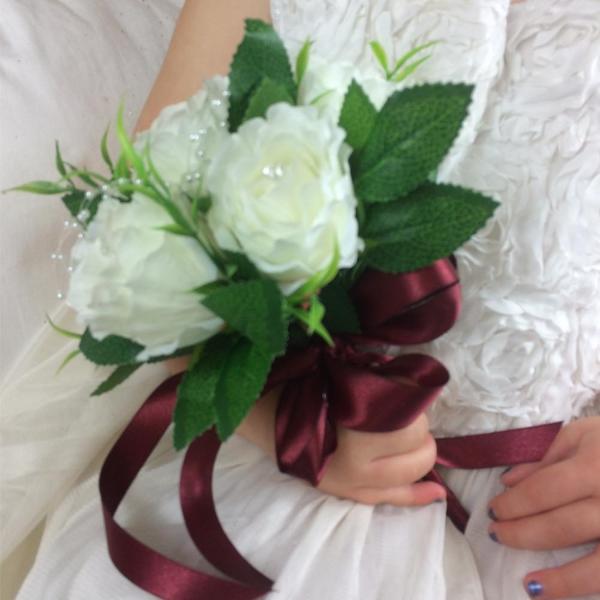 flower girl posy of silk ivory roses