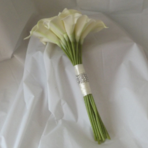 a wedding bouquet collection featuring artificial white real touch Calla Lily flowers