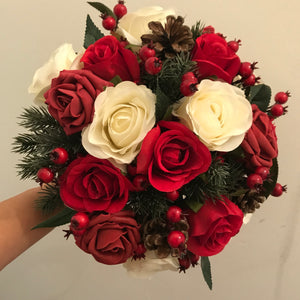 A Christmas wedding bouquet of artificial red and ivory roses