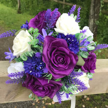 A teardrop bouquet collection of ivory and purple flowers