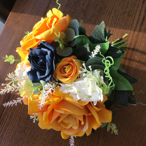 A teardrop bouquet collection of mustard and navy flowers