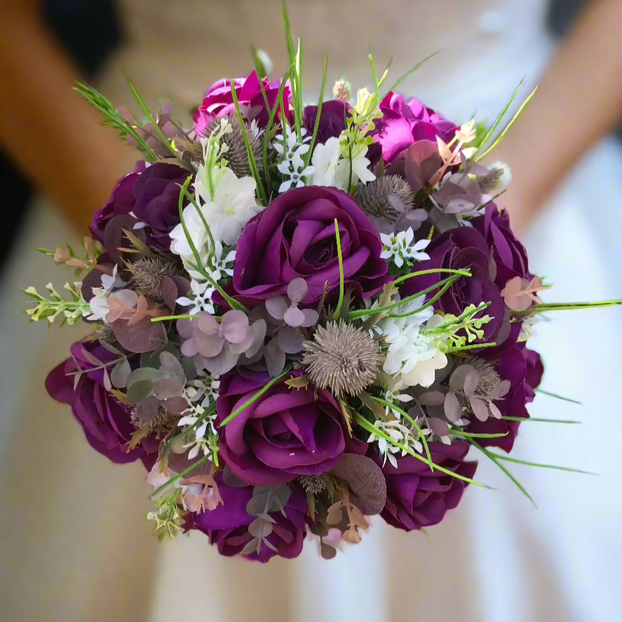 A collection of wedding bouquets featuring  artificial purple rose flowers & thistles