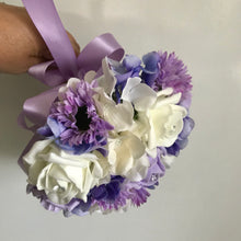 a small bridesmaids bouquet of ivory & lilac roses, daisies & hydrangea flowers