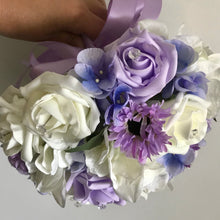 a bridesmaids bouquet of ivory & lilac roses, daisies & hydrangea flowers