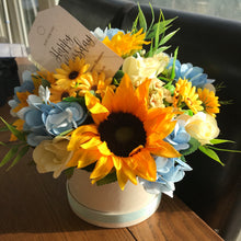 sunflowers and hydrangea in cream hat box