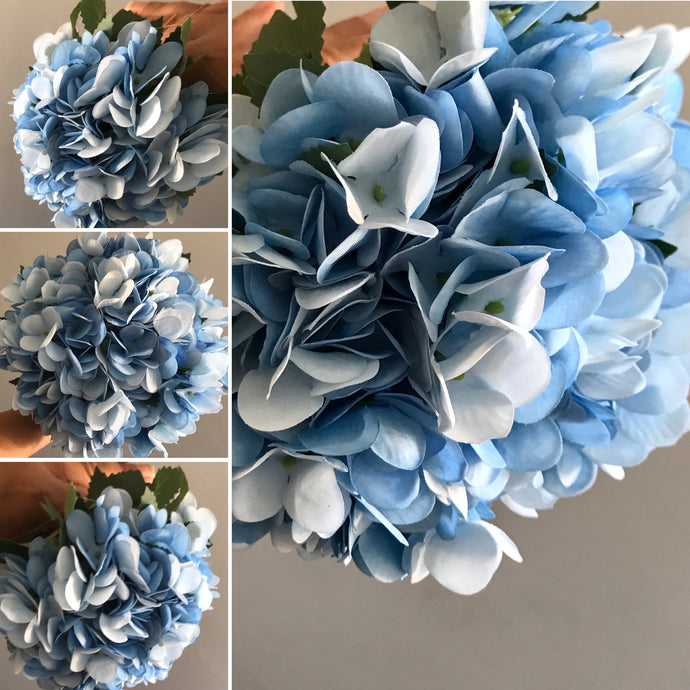 a bouquet of blue artificial hydrangea flowers