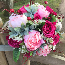 A wedding bouquet of silk pink peony & wine coloured roses