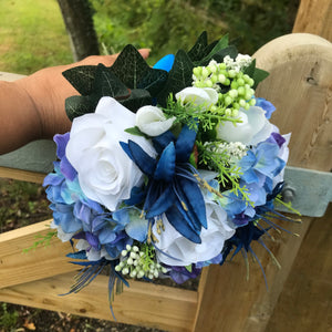 A bridesmaids bouquet of blue & white or ivory silk flowers
