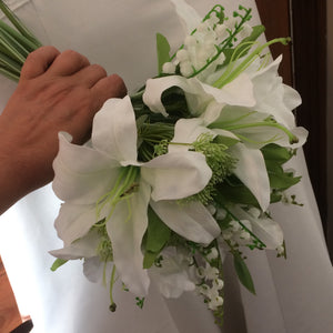 a wedding bouquet of silk lilies