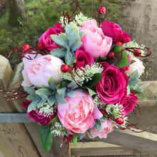 A wedding bouquet of silk pink peony & wine coloured roses
