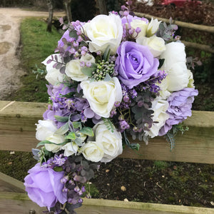 A teardrop bouquet collection of peonies and lilac artificial roses