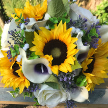 A wedding bouquet featuring calla lilies, roses & sunflowers