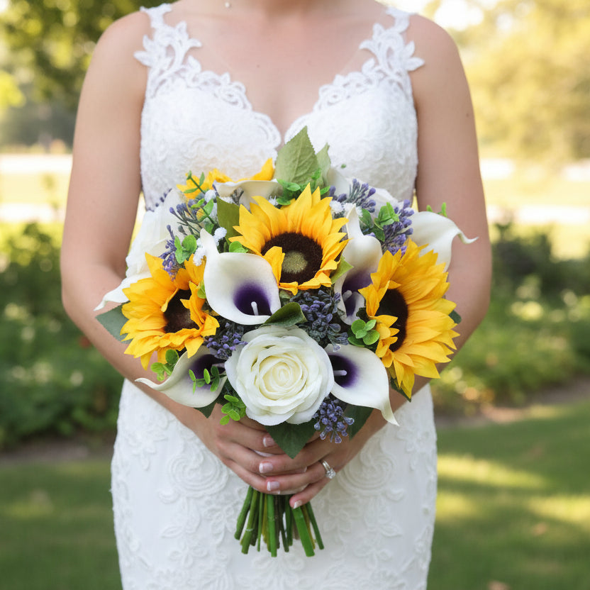 white calla lily and sunflower bouquets A wedding bouquet featuring calla lilies, roses & sunflowers
