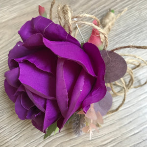 A collection of wedding bouquets featuring  artificial purple rose flowers & thistles