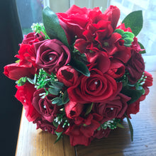 red artificial wedding bouquet