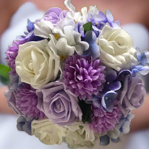 a bridesmaids bouquet of ivory & lilac roses, daisies & hydrangea flowers