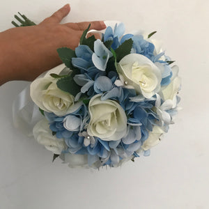 A wedding bouquet collection of blue and ivory or white roses & hydrangea