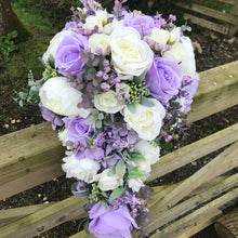 A teardrop bouquet collection of peonies and lilac artificial roses