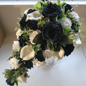 A teardrop bouquet collection of artificial roses, gyp and calla lily