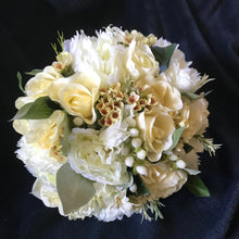 A brides bouquet of lemon and Ivory artificial flowers
