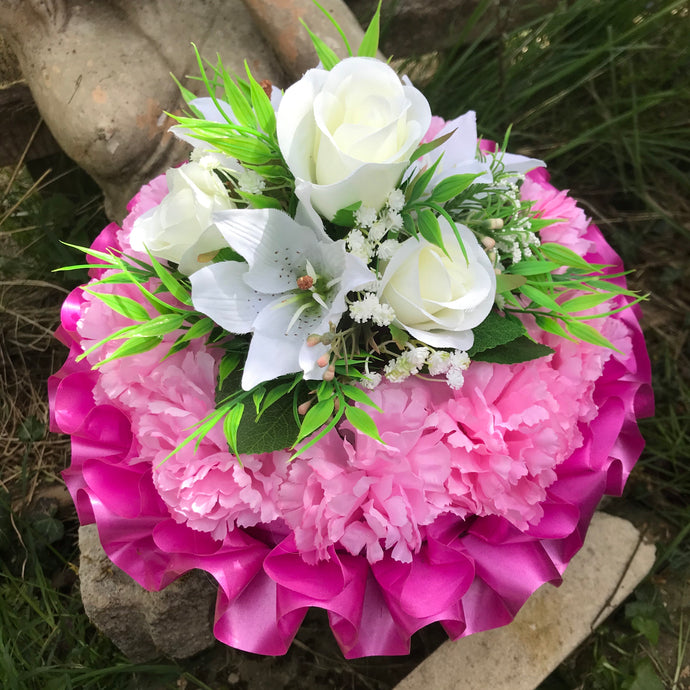 funeral posy of artificial flowers