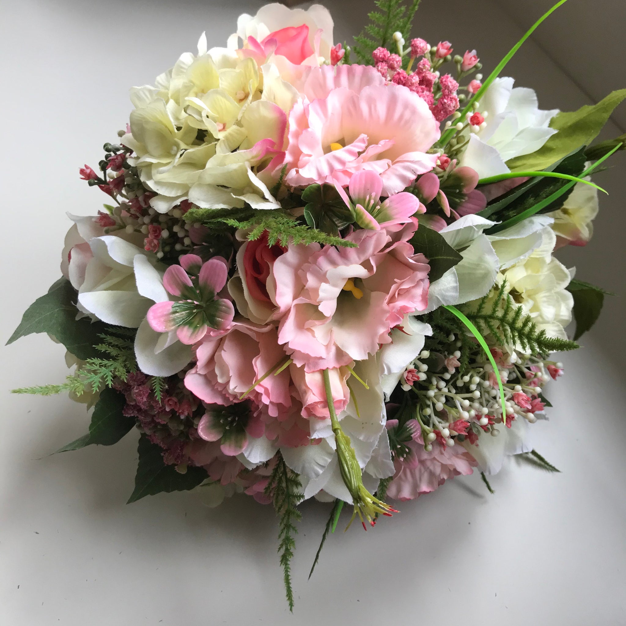 A bridal bouquet of Lisianthus roses and hydrangea – AbigailRose