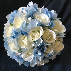 A wedding bouquet collection of blue and ivory or white roses & hydrangea