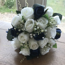 wedding bouquet of white and navy silk rose flowers