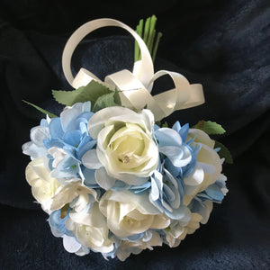 A wedding bouquet collection of blue and ivory or white roses & hydrangea