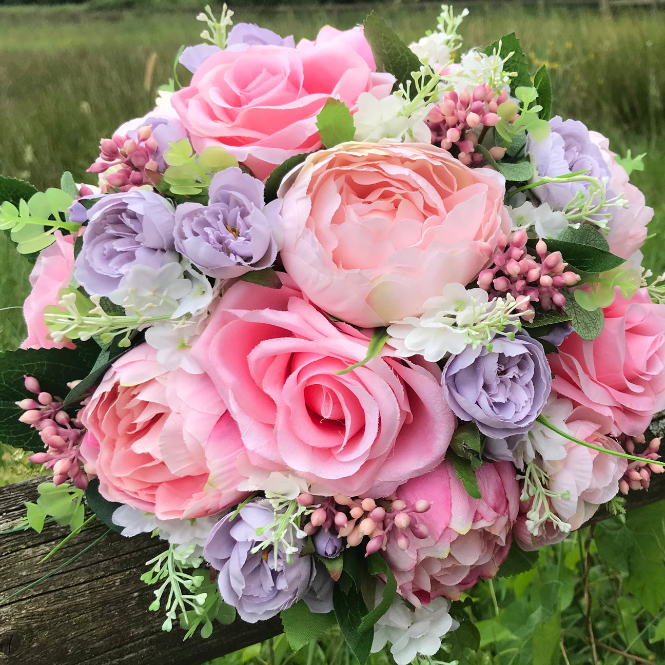 A wedding bouquet of lilac & pink artificial silk flowers AbigailRose