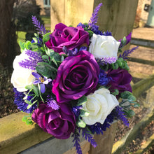 A teardrop bouquet collection of ivory and purple flowers