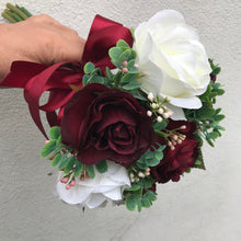 A bridesmaids bouquet of ivory & burgundy silk rose flowers