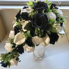 A teardrop bouquet collection of artificial roses, gyp and calla lily