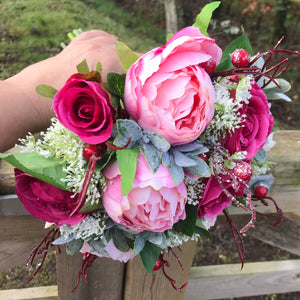 A wedding bouquet of silk pink peony & wine coloured roses