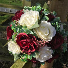 A wedding bouquet of ivory & burgundy silk rose flowers