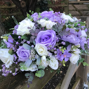 A teardrop bouquet collection of peonies and lilac artificial roses