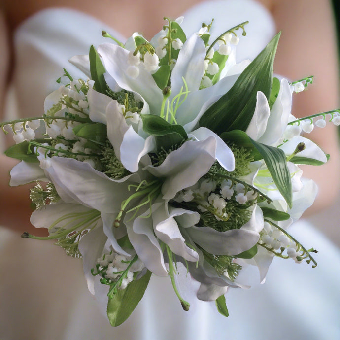 a bouquet of artificial white lilies