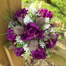 A collection of wedding bouquets featuring  artificial purple flowers & thistles