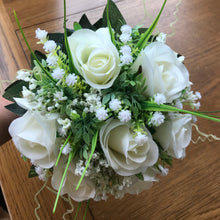 wedding bouquet of ivory roses and gyp
