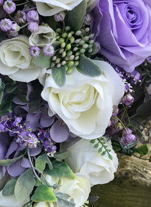 A teardrop bouquet collection of peonies and lilac artificial roses